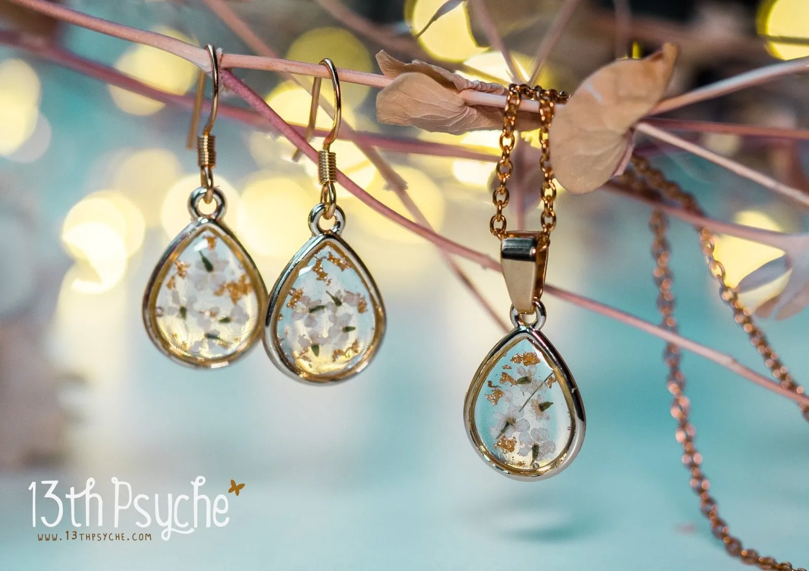 Dried white flowers and gold flakes resin teardrop jewelry set