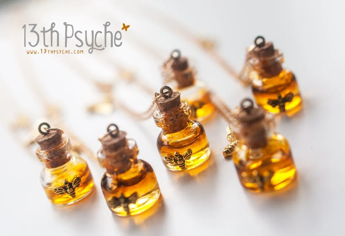 Honey bee and honeycomb bottle necklace