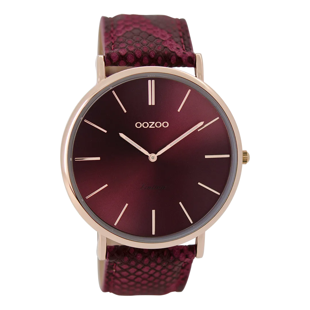 Rose gold coloured  watch with burgundy leather strap