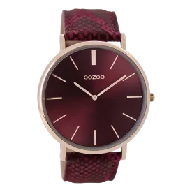 Rose gold coloured  watch with burgundy leather strap