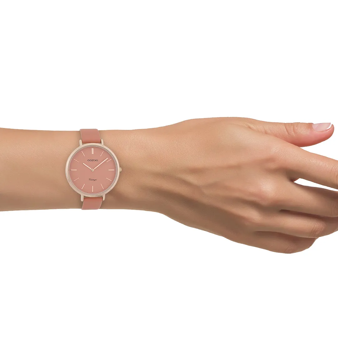 Rose gold coloured  watch with peach pink leather strap