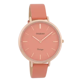 Rose gold coloured  watch with peach pink leather strap